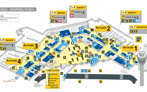 Plan lotniska w Amsterdamie Schiphol Plaza z oznaczeniami przylotów, odlotów i udogodnień.